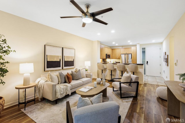 3090 Glascock St Unit 112, Oakland, CA 94601 - living room with light wood finished floors, ceiling fan, recessed lighting, and baseboards