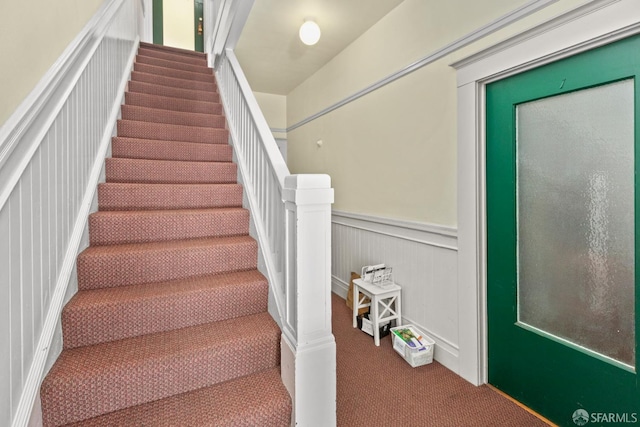4632 18th St, San Francisco, CA 94114 - stairs with carpet, a decorative wall, and a wainscoted wall