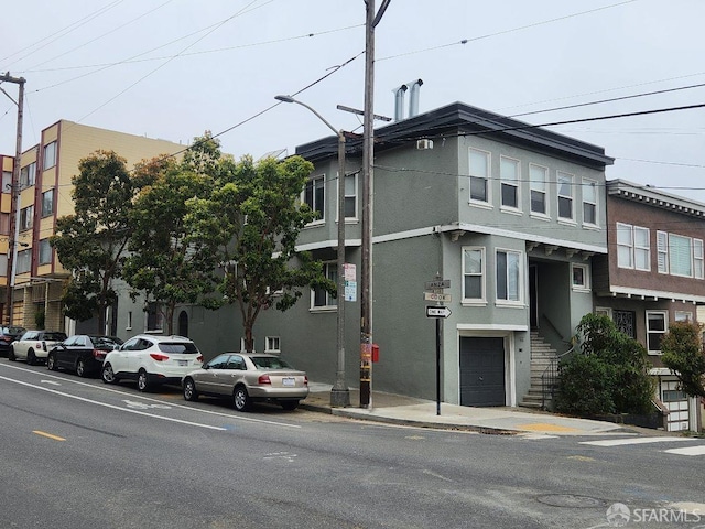 view of property featuring a garage