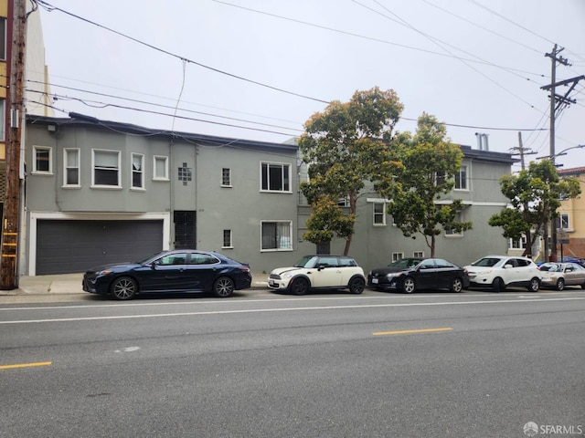 view of property with a garage