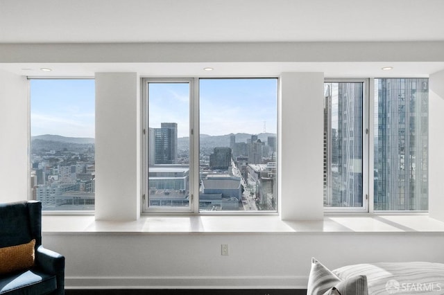 room details featuring a view of city and a mountain view