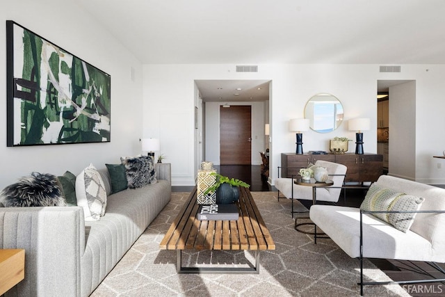 living room featuring visible vents