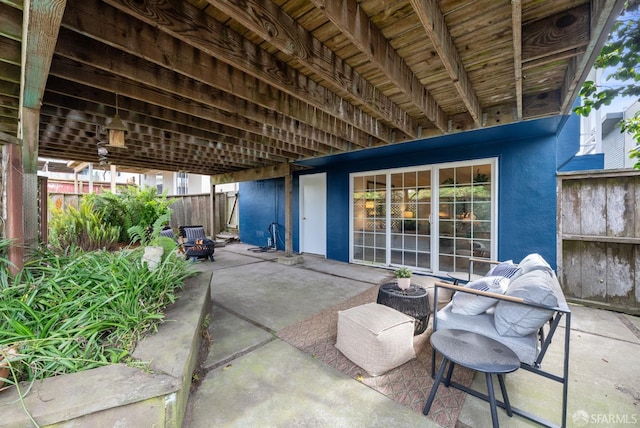 245 Skyline Dr, Daly City, CA 94015 - fenced backyard with a patio and a fire pit