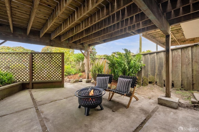 245 Skyline Dr, Daly City, CA 94015 - fenced backyard with a fire pit and a patio area