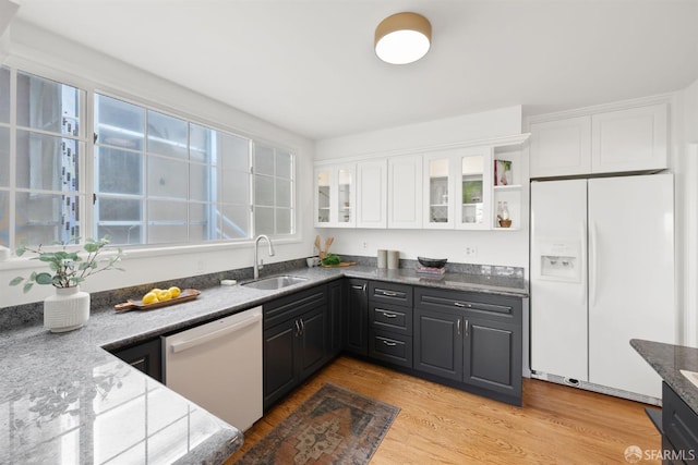 245 Skyline Dr, Daly City, CA 94015 - kitchen featuring white appliances, white cabinetry, and light wood finished floors