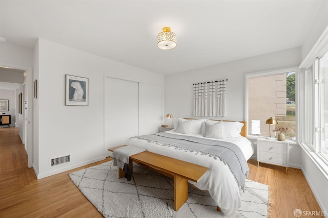 245 Skyline Dr, Daly City, CA 94015 - bedroom featuring a closet and light wood-style flooring