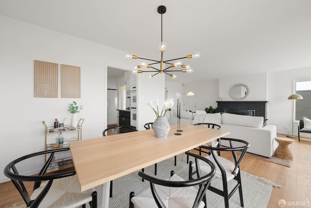 245 Skyline Dr, Daly City, CA 94015 - dining space featuring a chandelier and light wood finished floors