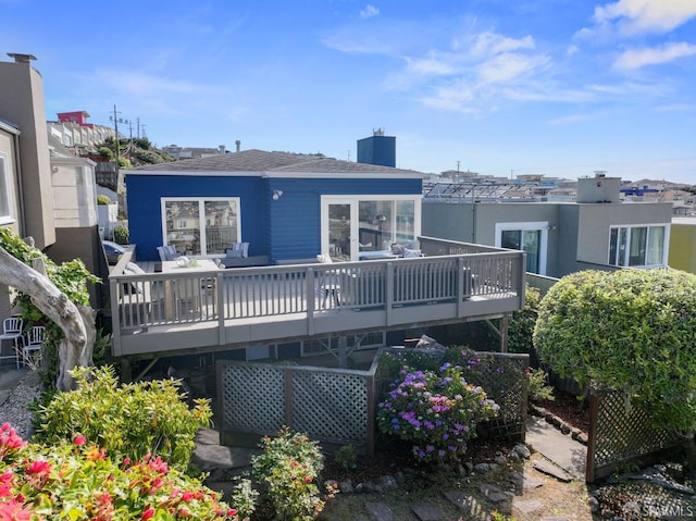 245 Skyline Dr, Daly City, CA 94015 - rear view of house with a chimney, a wooden deck, and roof with shingles