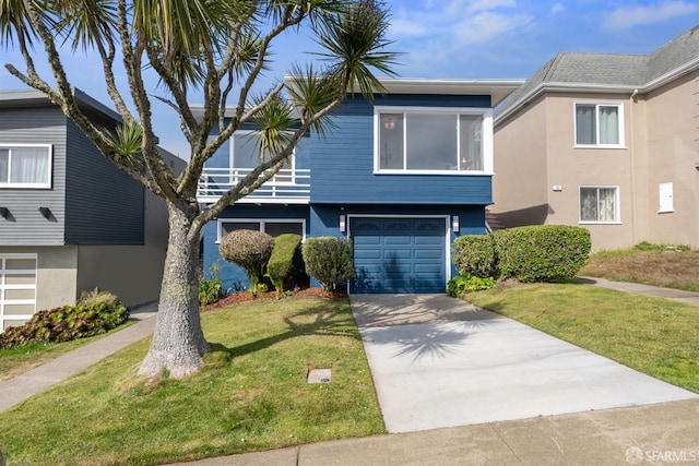 245 Skyline Dr, Daly City, CA 94015 - view of front of home with concrete driveway, a garage, stucco siding, and a front lawn