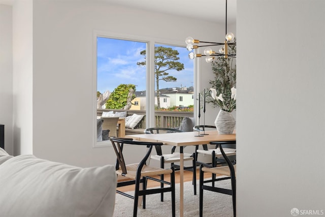 245 Skyline Dr, Daly City, CA 94015 - dining area featuring wood finished floors and a chandelier