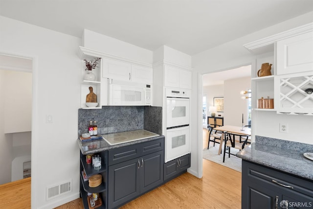 245 Skyline Dr, Daly City, CA 94015 - kitchen featuring open shelves, white appliances, white cabinets, and light wood finished floors