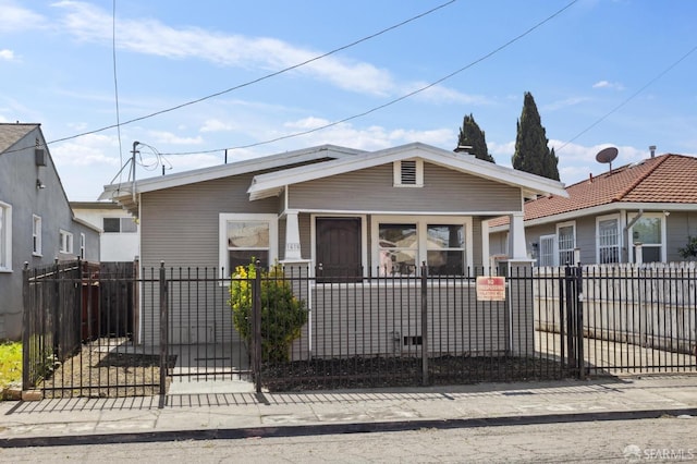 view of front of property featuring a gate and a fenced front yard