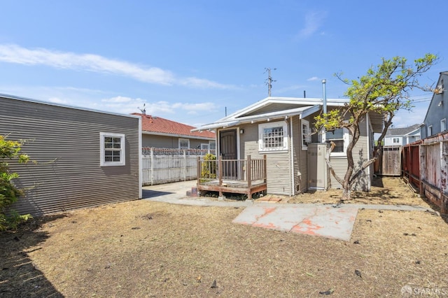 exterior space with a fenced backyard