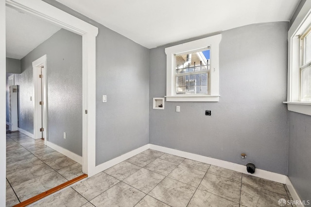 washroom featuring hookup for an electric dryer, laundry area, hookup for a gas dryer, baseboards, and hookup for a washing machine