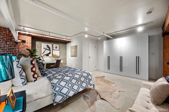 461 2nd St Unit C135, San Francisco, CA 94107 - bedroom with track lighting, light colored carpet, and brick wall