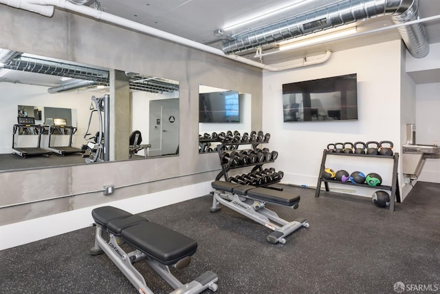 workout area with baseboards