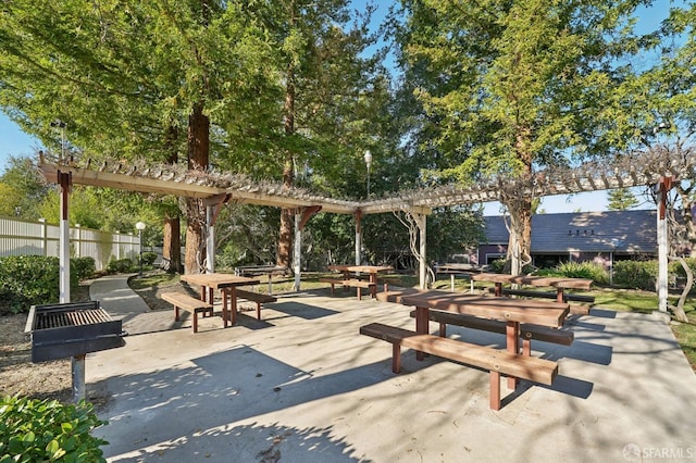 view of property's community with a patio area