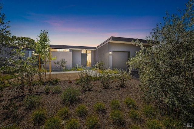 view of front of home featuring an attached garage