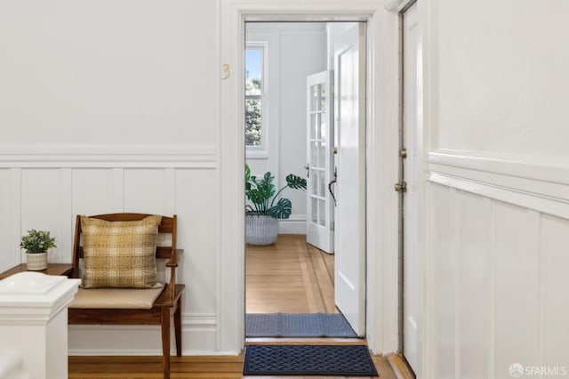 1015 Ashbury St Unit 3, San Francisco, CA 94117 - hallway featuring a decorative wall, wood finished floors, and a wainscoted wall