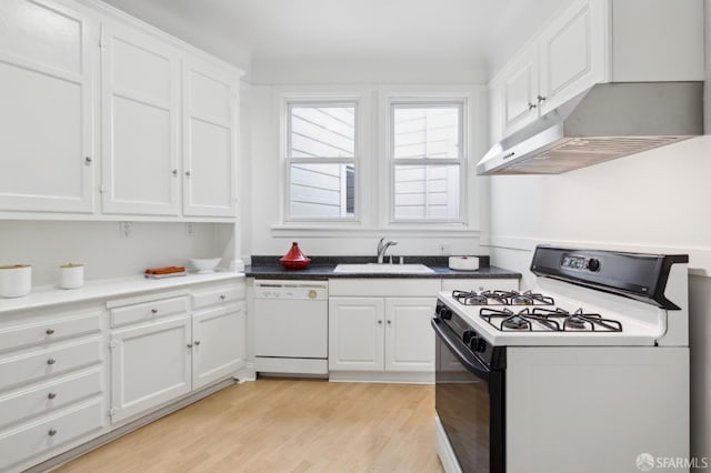 1015 Ashbury St Unit 3, San Francisco, CA 94117 - kitchen featuring white appliances, white cabinetry, light wood-style floors, and under cabinet range hood