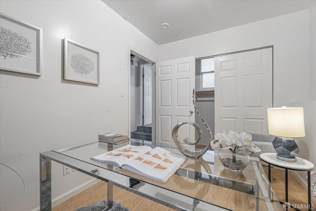 home office featuring hardwood / wood-style floors