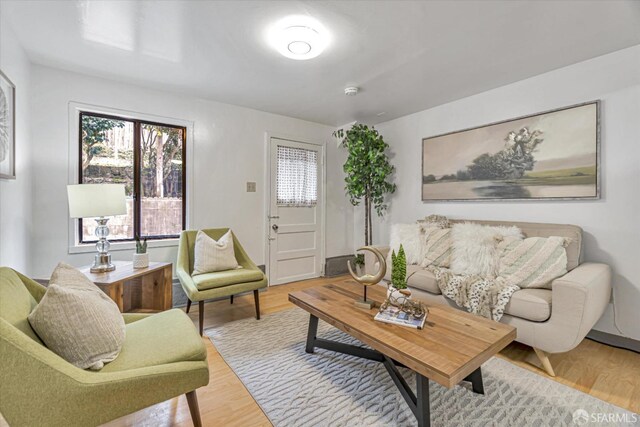 living room with light hardwood / wood-style floors