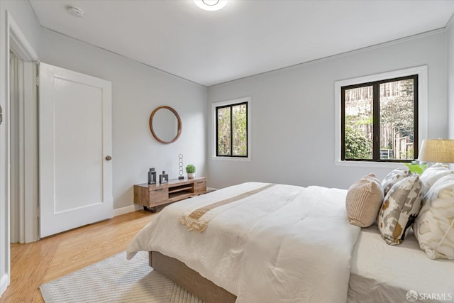 bedroom featuring light hardwood / wood-style floors