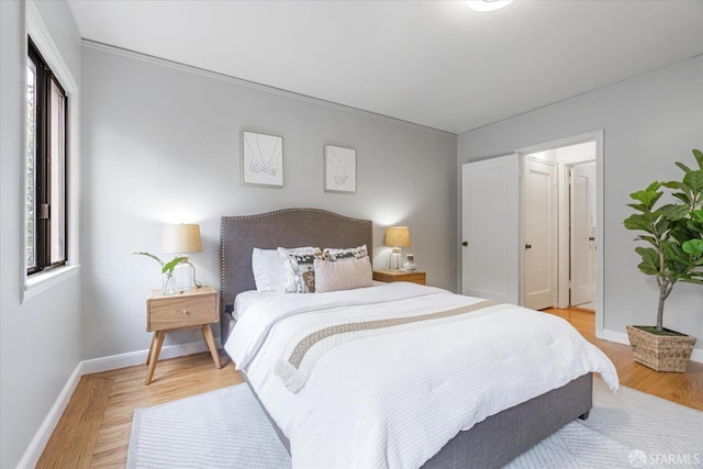 bedroom featuring hardwood / wood-style flooring