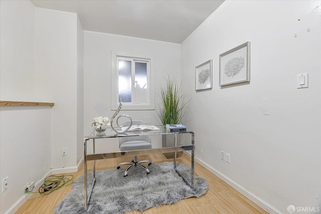 office area with wood-type flooring