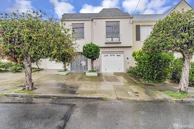 view of front of property featuring a garage