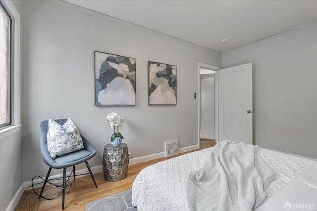 bedroom featuring hardwood / wood-style floors