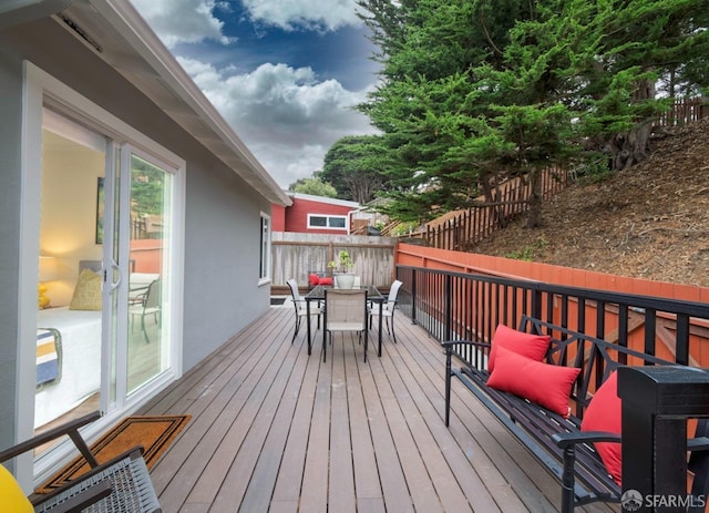 636 Edgemar Ave, Pacifica, CA 94044 - wooden deck featuring outdoor dining space and a fenced backyard
