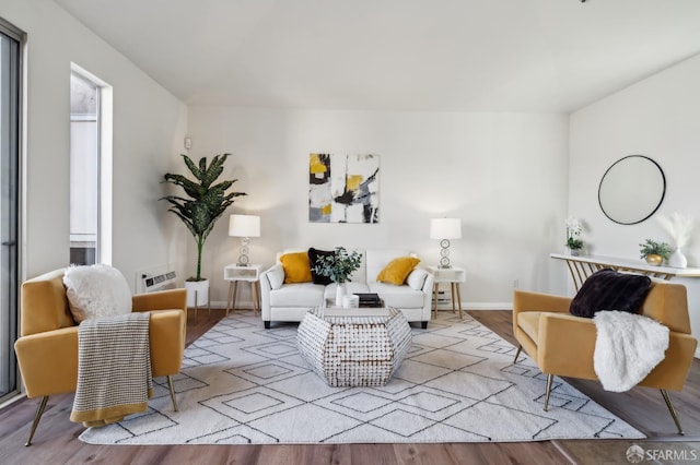 interior space with plenty of natural light and light hardwood / wood-style flooring