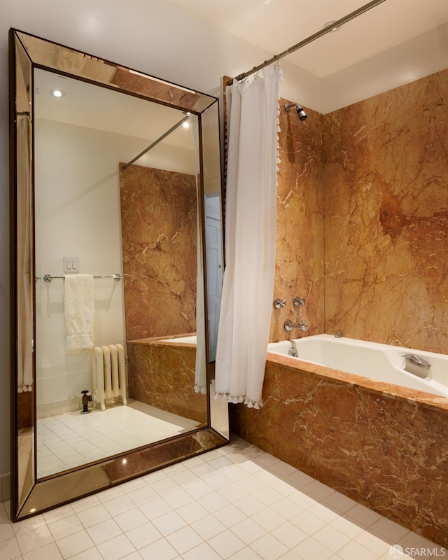 bathroom with tile patterned flooring, radiator, and a combined bath / shower with marble appearance