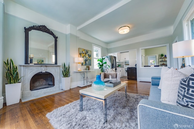 276 Bemis St, San Francisco, CA 94131 - living area featuring wood finished floors, healthy amount of natural light, and a fireplace