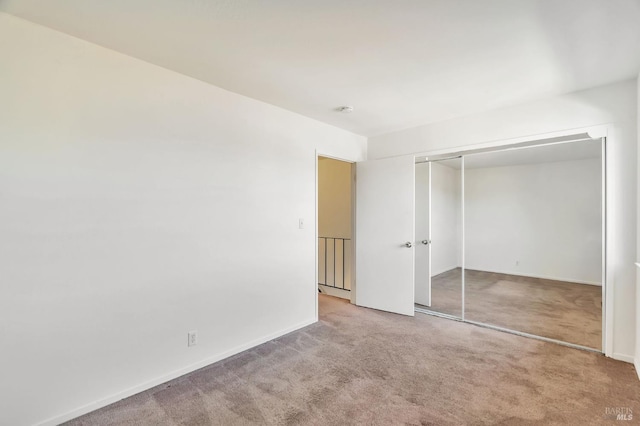 1285 Redwood Blvd Unit C, Novato, CA 94947 - unfurnished bedroom featuring carpet and a closet
