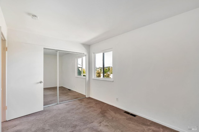 1285 Redwood Blvd Unit C, Novato, CA 94947 - unfurnished bedroom with carpet floors and a closet