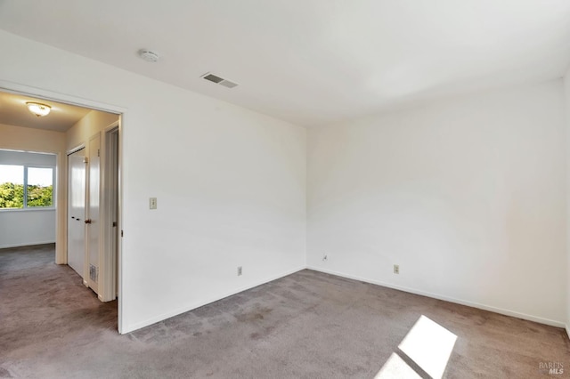 1285 Redwood Blvd Unit C, Novato, CA 94947 - carpeted spare room with baseboards and a smoke detector