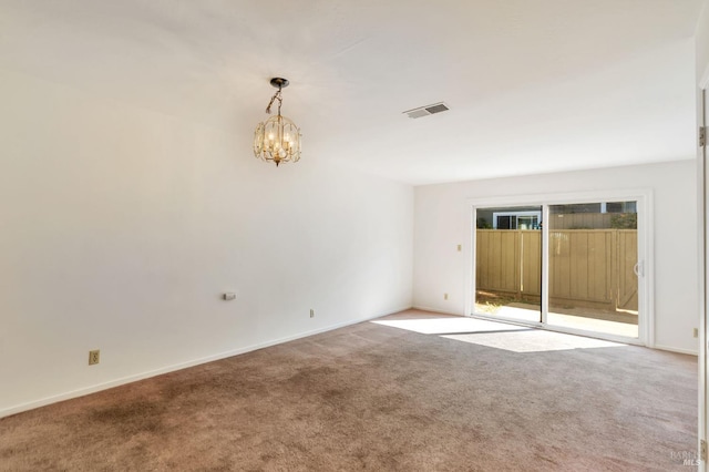 1285 Redwood Blvd Unit C, Novato, CA 94947 - unfurnished bedroom featuring access to outside, carpet floors, and a chandelier