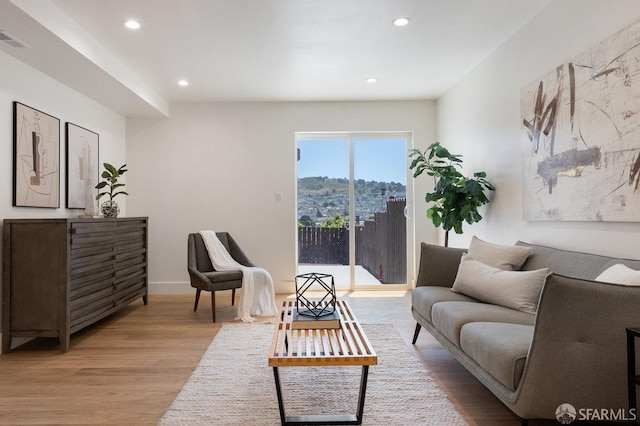 69 Lobos St, San Francisco, CA 94112 - living room featuring wood finished floors and recessed lighting