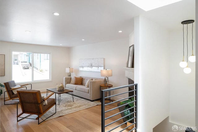 69 Lobos St, San Francisco, CA 94112 - living area featuring light wood finished floors and recessed lighting