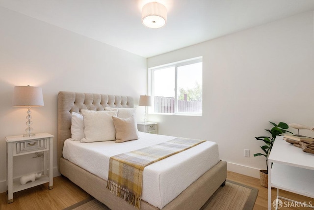 69 Lobos St, San Francisco, CA 94112 - bedroom with light wood finished floors and baseboards