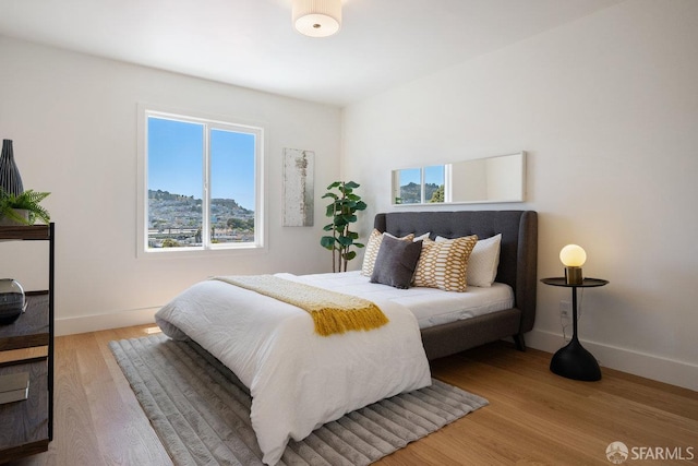69 Lobos St, San Francisco, CA 94112 - bedroom with wood finished floors and baseboards
