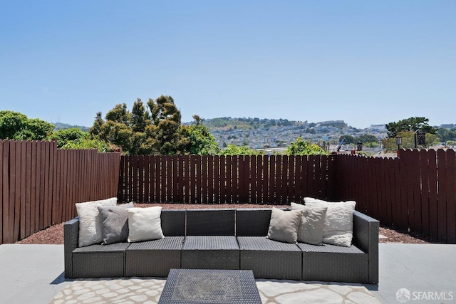 69 Lobos St, San Francisco, CA 94112 - fenced backyard featuring an outdoor living space and a patio