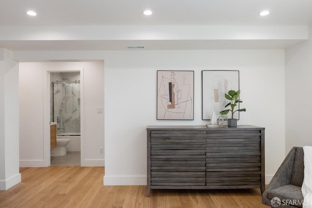 69 Lobos St, San Francisco, CA 94112 - bedroom with wood finished floors, recessed lighting, and ensuite bath