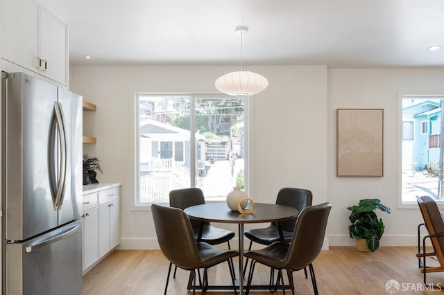 69 Lobos St, San Francisco, CA 94112 - dining room featuring light wood finished floors and baseboards
