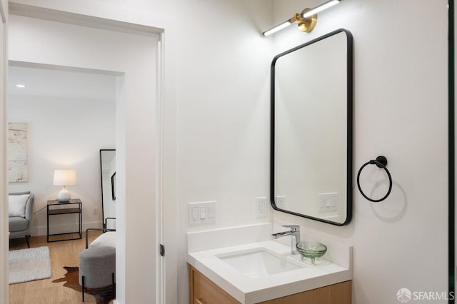69 Lobos St, San Francisco, CA 94112 - bathroom with vanity, wood finished floors, and ensuite bathroom