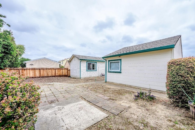 311 Linden Ave, San Bruno, CA 94066 - rear view of house with a fenced backyard and a patio area