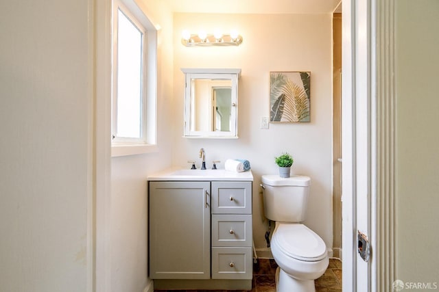 311 Linden Ave, San Bruno, CA 94066 - bathroom featuring vanity, baseboards, and toilet