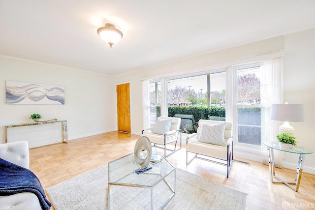 311 Linden Ave, San Bruno, CA 94066 - living room with baseboards, ornamental molding, and visible vents